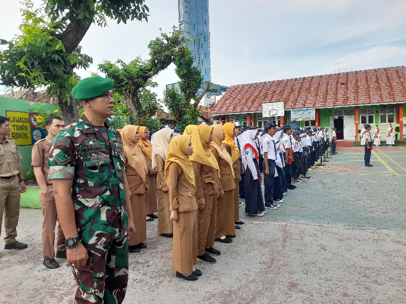 Babinsa Koramil 410-05/TKP Tanamkan Nilai-Nilai Pancasila Lewat Program Babinsa Go To School