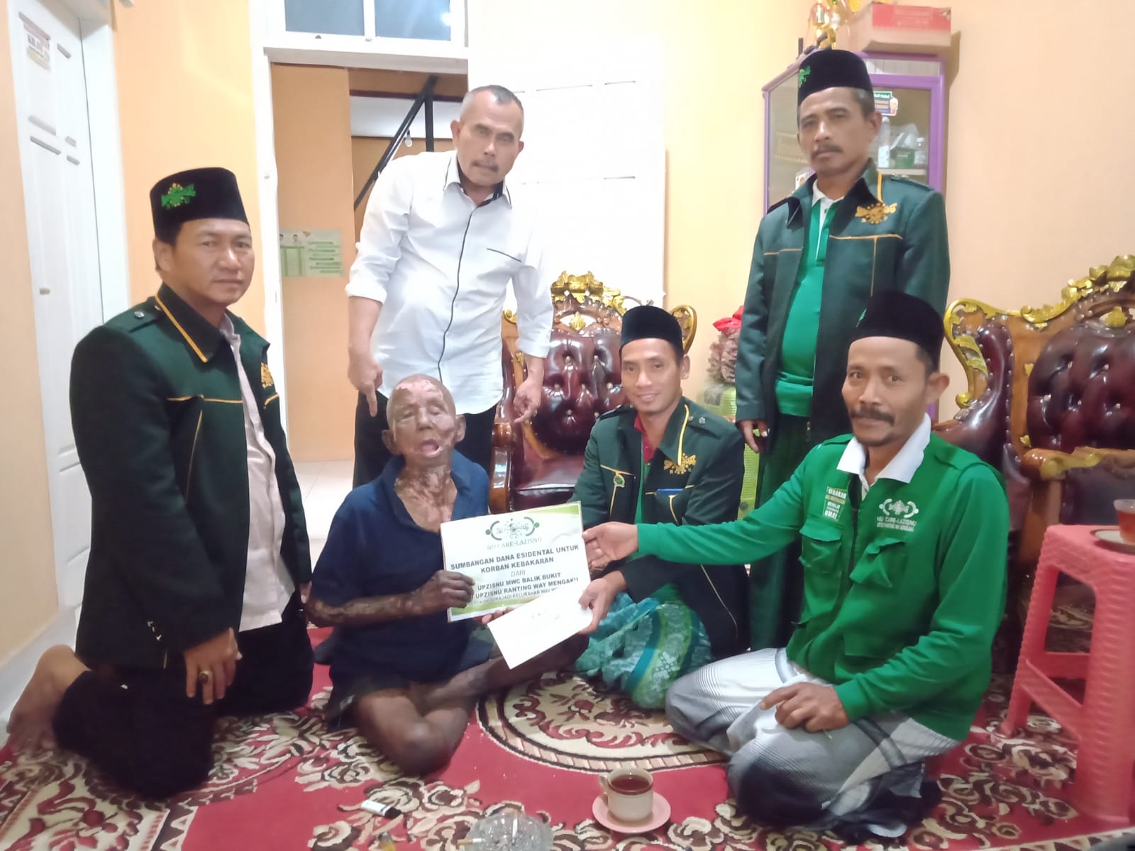 Peduli Korban Kebakaran, MWCNU Balik Bukit Salurkan Bantuan 