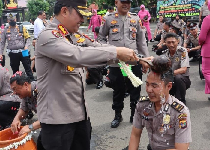 Kapolresta Bandar Lampung Pimpin Upacara Kenaikan Pangkat 81 Personel