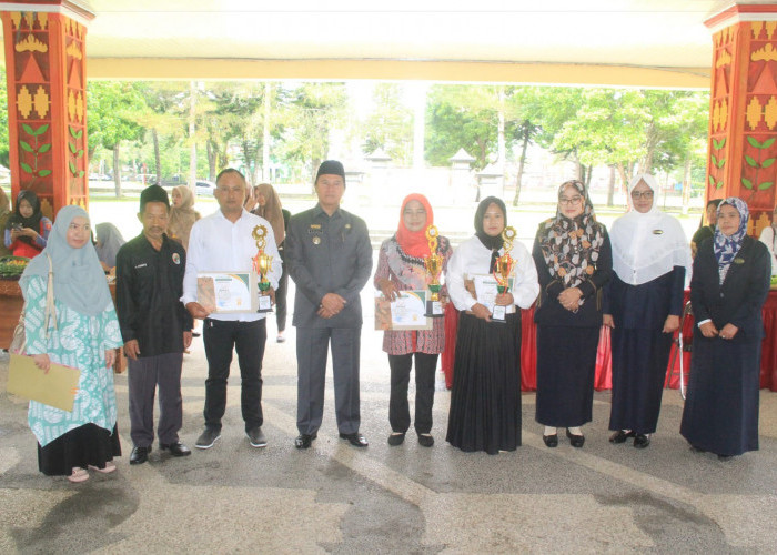Harkopnas Ke-76, Pj Bupati Lampung Barat Berikan Penghargaan