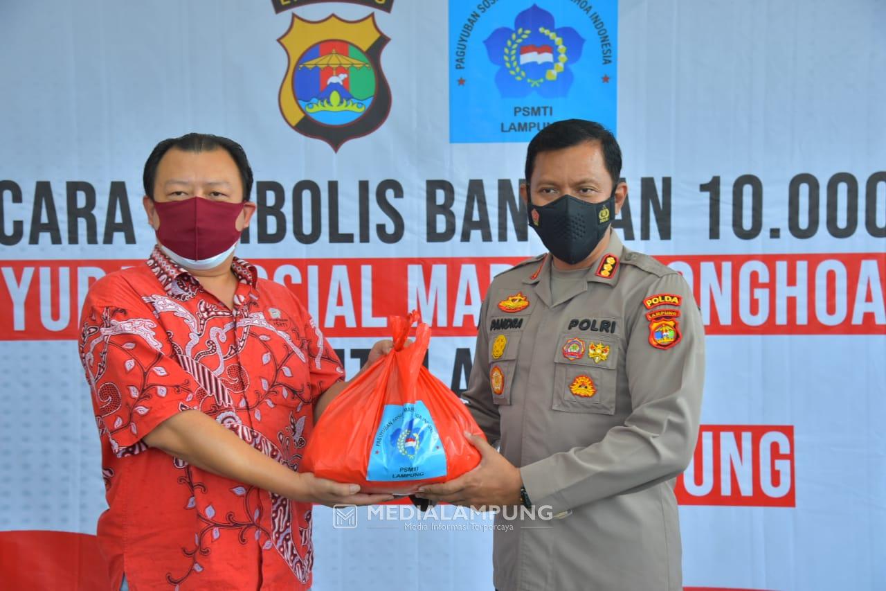 PSMTI Serahkan Bantuan 10.000 Paket Sembako ke Polda Lampung