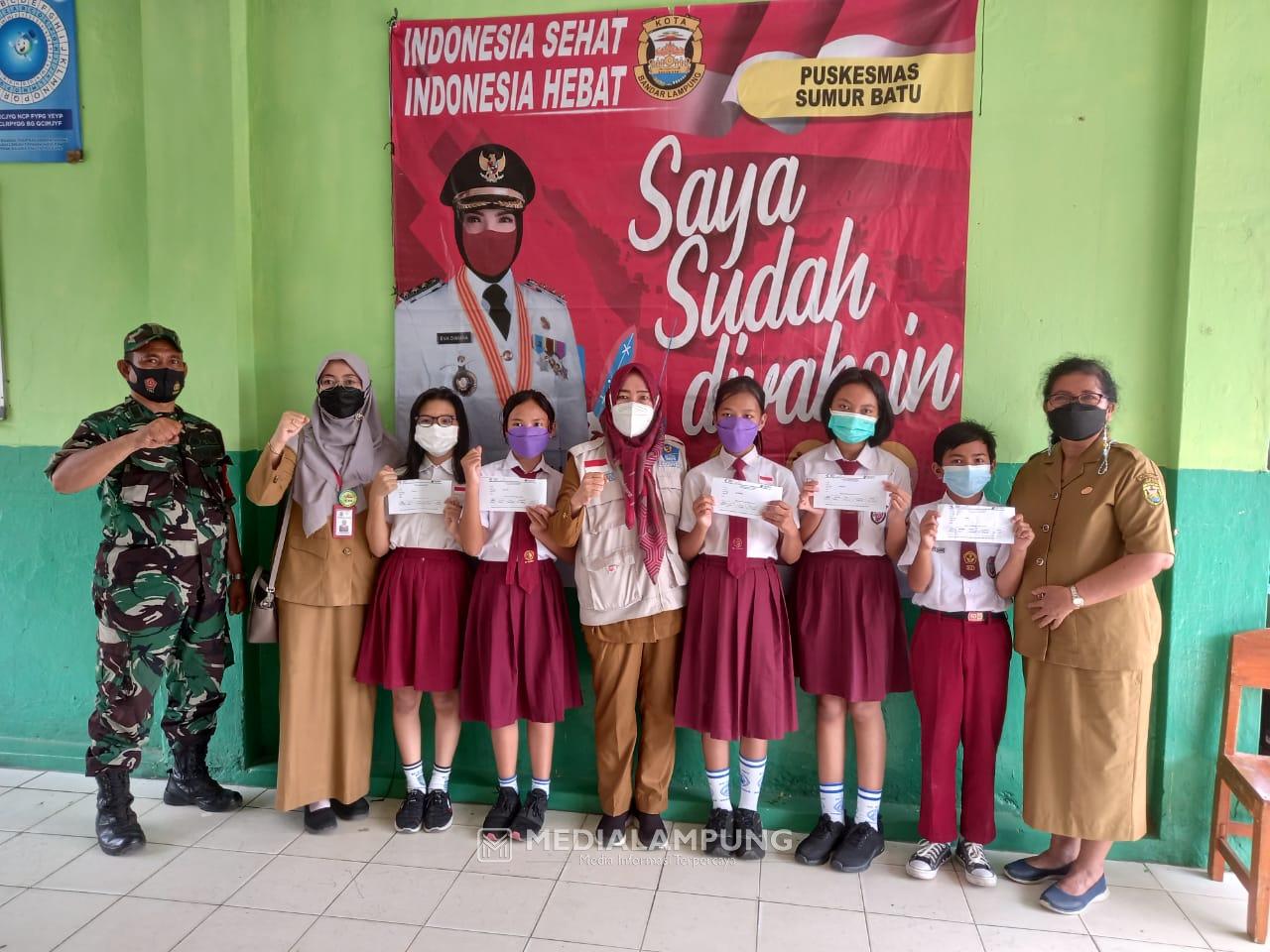 Koramil TBU Bersama Puskesmas Sumurbatu Adakan Vaksinasi Bagi Anak