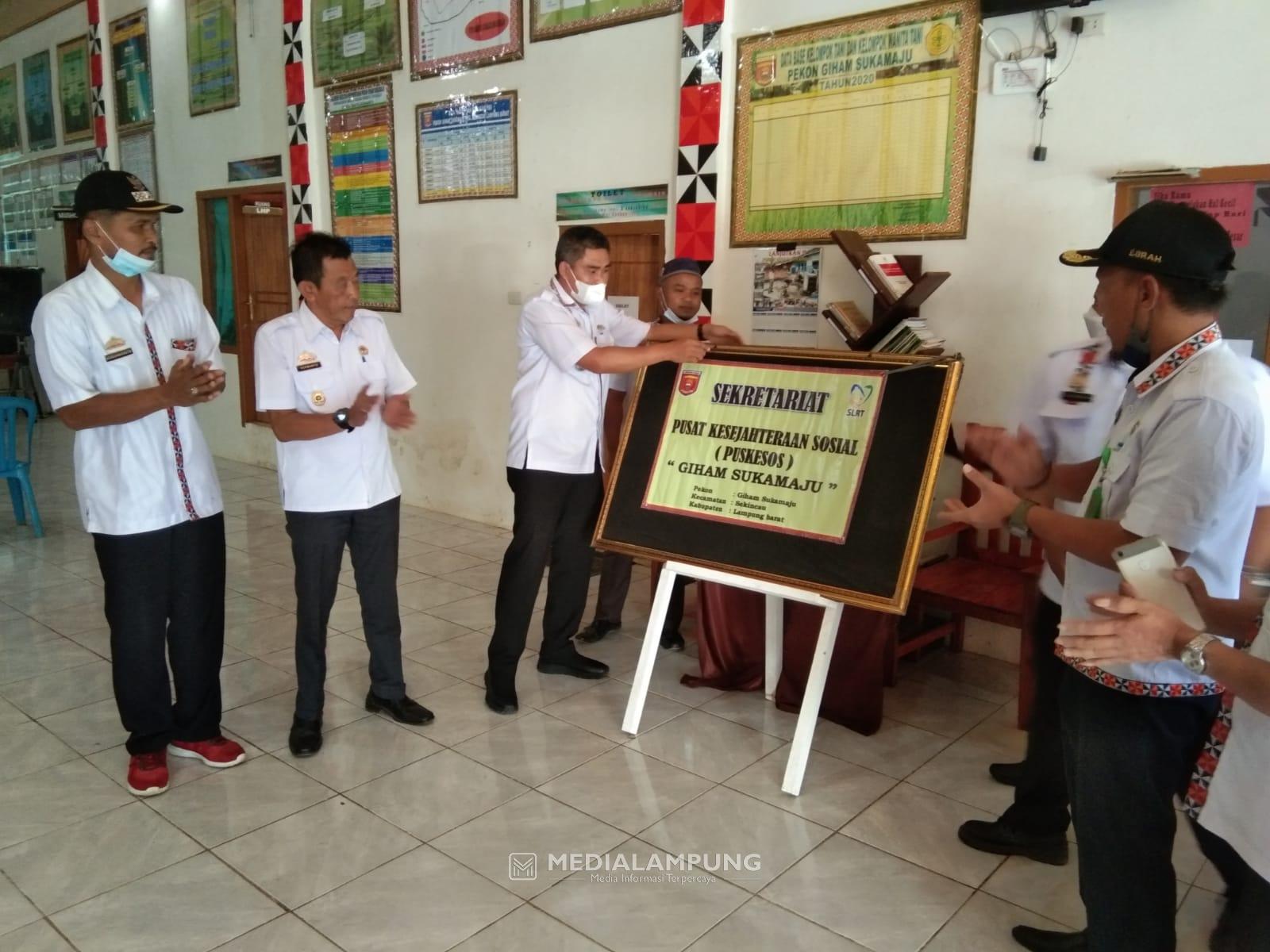 Dinsos Lambar Launching Puskesos SLRT di Aula Pekon Giham Sukamaju